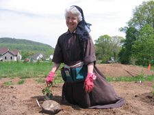 Mother Shaun Vergauwen, F.S.E. in the community’s new rose garden in Meriden, Connecticut.