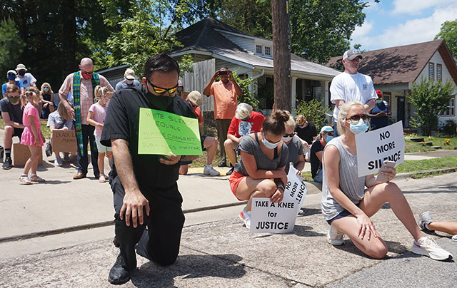 Father Rubén Quinteros of the Diocese of Little Rock, Arkansas is among Catholics and members of other churches who “took a knee” at a June 2020 Little Rock rally
