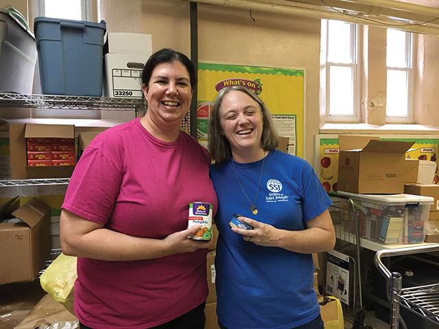 Sister Colleen Gibson, S.S.J. (right) with a co-worker at the Sisters of Saint Joseph Neighborhood Center in Camden, New Jersey.